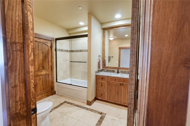 421 Rainbow Dr Unit 12, Silverthorne, CO 80498 - bathroom with toilet, enclosed tub / shower combo, tile patterned flooring, vanity, and recessed lighting