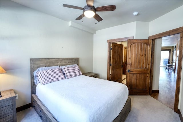 421 Rainbow Dr Unit 12, Silverthorne, CO 80498 - bedroom with carpet floors, a ceiling fan, and baseboards