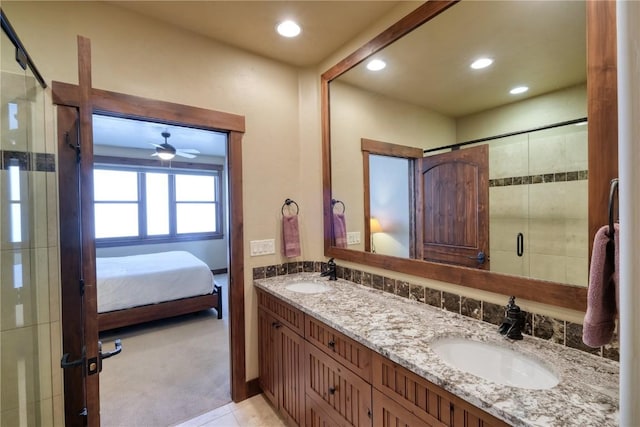 421 Rainbow Dr Unit 12, Silverthorne, CO 80498 - full bath featuring a stall shower, recessed lighting, double vanity, ensuite bath, and ceiling fan