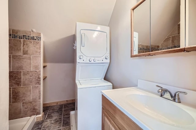 full bathroom with vanity and tiled shower