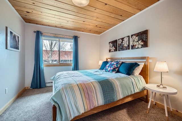 bedroom featuring baseboard heating, wooden ceiling, and carpet