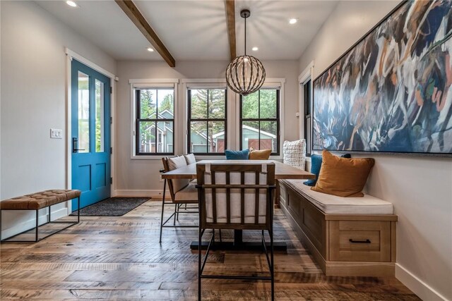 208 N Ridge St, Breckenridge, CO 80424 - interior space featuring beamed ceiling, plenty of natural light, and a notable chandelier
