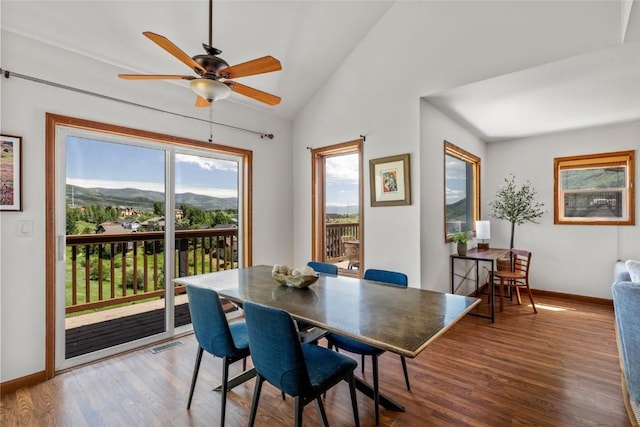 524 Buena Vista Ct, Steamboat Springs, CO 80487 - dining room featuring wood finished floors, a ceiling fan, lofted ceiling, and a mountain view