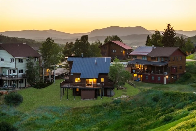 524 Buena Vista Ct, Steamboat Springs, CO 80487 - yard at dusk with a mountain view and a yard