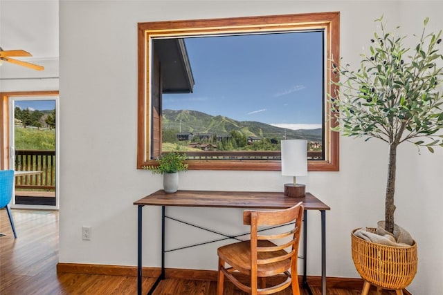 524 Buena Vista Ct, Steamboat Springs, CO 80487 - home office featuring wood finished floors, ceiling fan, and a mountain view