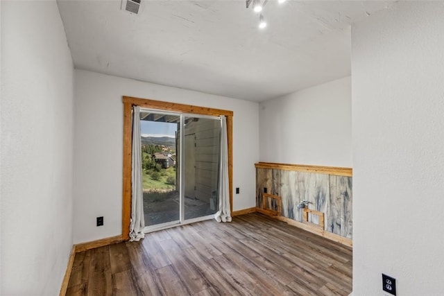 524 Buena Vista Ct, Steamboat Springs, CO 80487 - unfurnished room featuring wood finished floors and baseboards