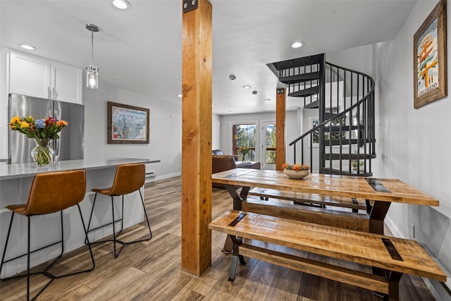 112 Illinois Gulch Rd Unit 6, Breckenridge, CO 80424 - dining area with recessed lighting, light wood-style floors, and stairs