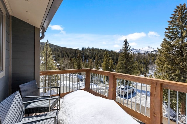 112 Illinois Gulch Rd Unit 6, Breckenridge, CO 80424 - snow covered back of property with a wooded view and a mountain view