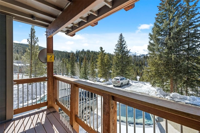 112 Illinois Gulch Rd Unit 6, Breckenridge, CO 80424 - snow covered deck featuring a view of trees