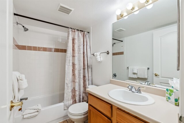283 Pelican Cir Unit 1703, Breckenridge, CO 80424 - bathroom featuring vanity, toilet, visible vents, and shower / bath combo