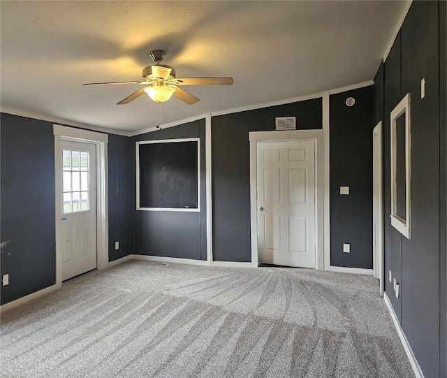 21762 4th Ave, Phippsburg, CO 80469 - unfurnished bedroom featuring carpet and a ceiling fan