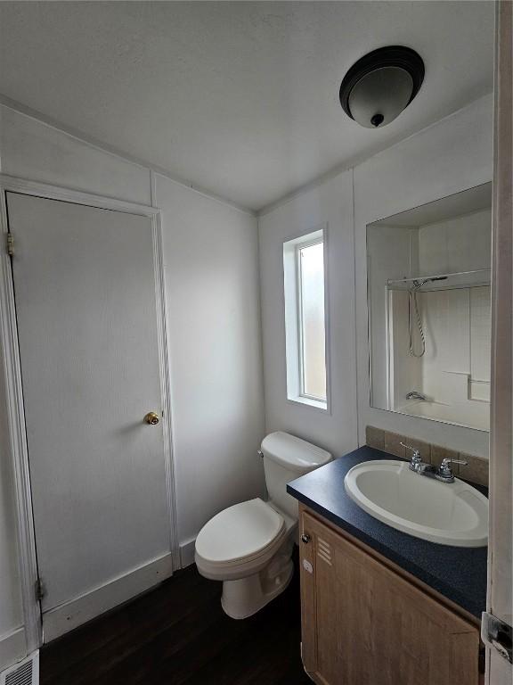 21762 4th Ave, Phippsburg, CO 80469 - bathroom with vanity and wood finished floors