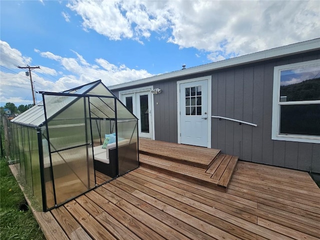 21762 4th Ave, Phippsburg, CO 80469 - wooden terrace featuring an exterior structure and an outbuilding