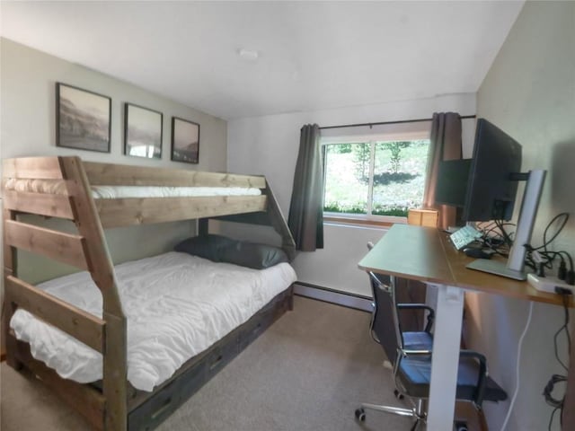9876 Ryan Gulch Rd Unit 106, Silverthorne, CO 80498 - bedroom with carpet, a baseboard radiator, and a desk