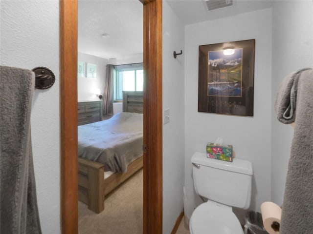 9876 Ryan Gulch Rd Unit 106, Silverthorne, CO 80498 - bathroom with toilet and ensuite bath