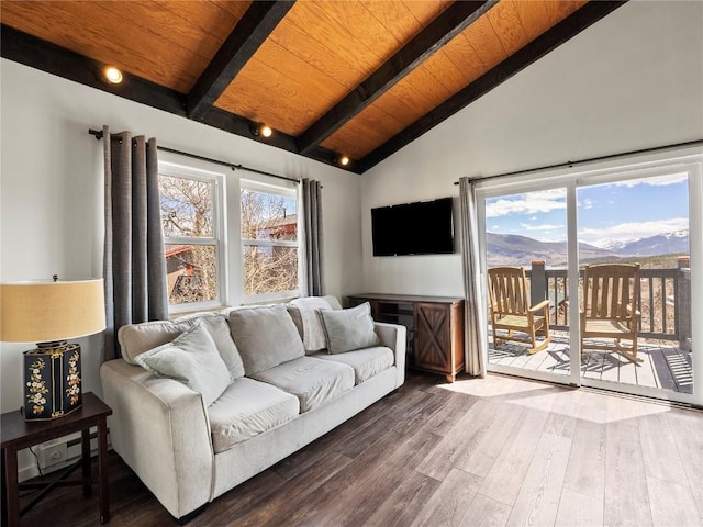 8012 Ryan Gulch Rd Unit B3, Silverthorne, CO 80498 - living room with wood ceiling with exposed beams, wood finished floors, and high vaulted ceiling