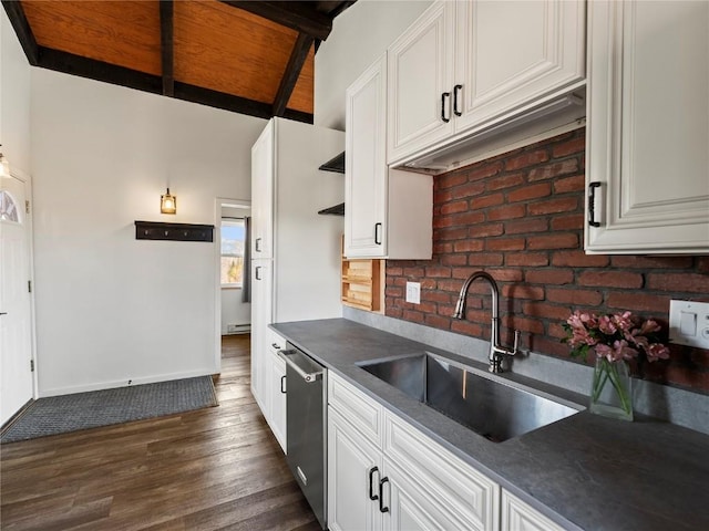 8012 Ryan Gulch Rd Unit B3, Silverthorne, CO 80498 - kitchen featuring a sink, dishwasher, dark countertops, dark wood-style floors, and white cabinets