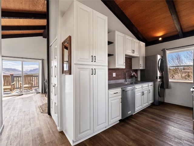 8012 Ryan Gulch Rd Unit B3, Silverthorne, CO 80498 - kitchen featuring dishwasher, wood ceiling, stacked washer / drying machine, open shelves, and dark wood finished floors