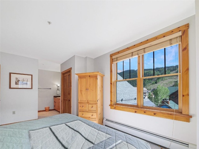 100 Dercum Sq Unit 8389, Keystone, CO 80435 - carpeted bedroom featuring a baseboard heating unit and baseboards