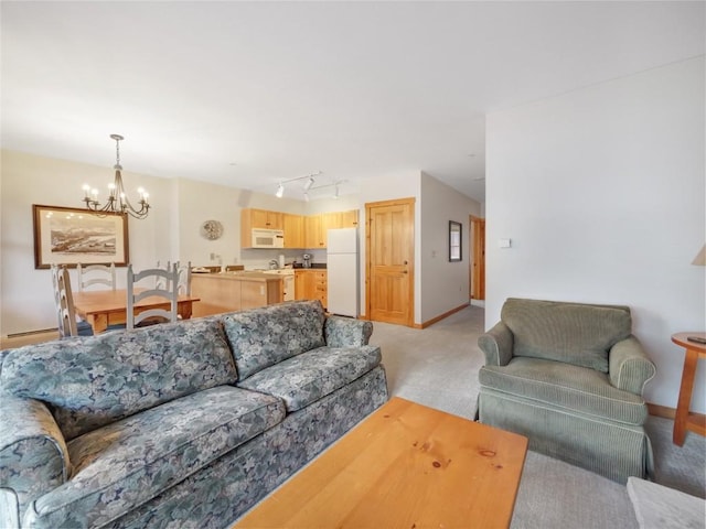 100 Dercum Sq Unit 8389, Keystone, CO 80435 - living room featuring light colored carpet and a chandelier