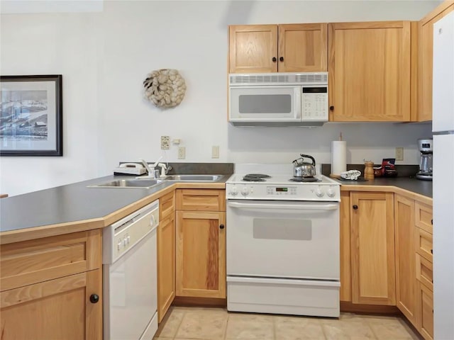 100 Dercum Sq Unit 8389, Keystone, CO 80435 - kitchen with white appliances, a peninsula, light tile patterned flooring, and light brown cabinetry
