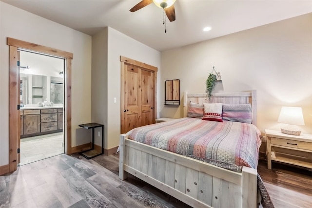 52 Buckskin Ln, Silverthorne, CO 80498 - bedroom with wood finished floors, connected bathroom, a ceiling fan, a closet, and recessed lighting