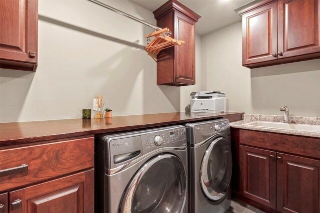 168 Corkscrew Dr, Breckenridge, CO 80424 - laundry area featuring washer and clothes dryer and cabinet space