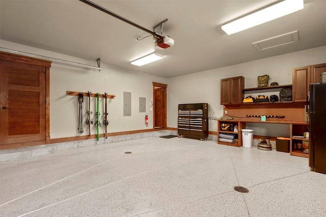 168 Corkscrew Dr, Breckenridge, CO 80424 - garage featuring electric panel and a garage door opener