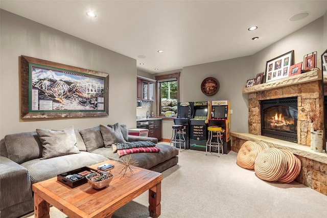 168 Corkscrew Dr, Breckenridge, CO 80424 - living room with carpet floors, a stone fireplace, and recessed lighting