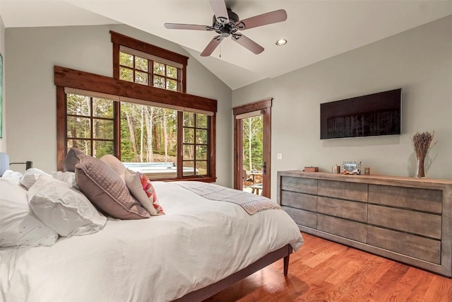 168 Corkscrew Dr, Breckenridge, CO 80424 - bedroom featuring access to outside, lofted ceiling, multiple windows, wood finished floors, and recessed lighting
