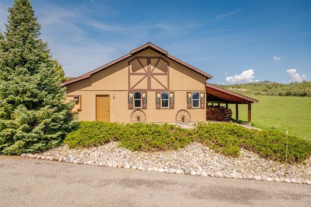23125 Fawn Creek Rd, Steamboat Springs, CO 80487 - view of front of home featuring a front lawn