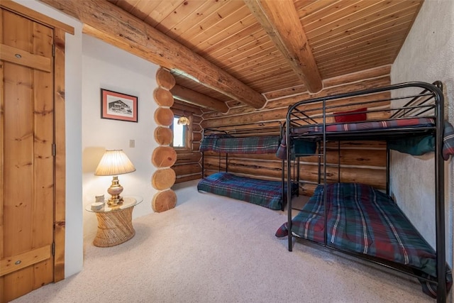 23125 Fawn Creek Rd, Steamboat Springs, CO 80487 - bedroom with rustic walls, carpet, and wood ceiling with exposed beams