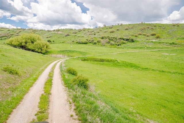 23125 Fawn Creek Rd, Steamboat Springs, CO 80487 - view of community with dirt driveway and a view of countryside