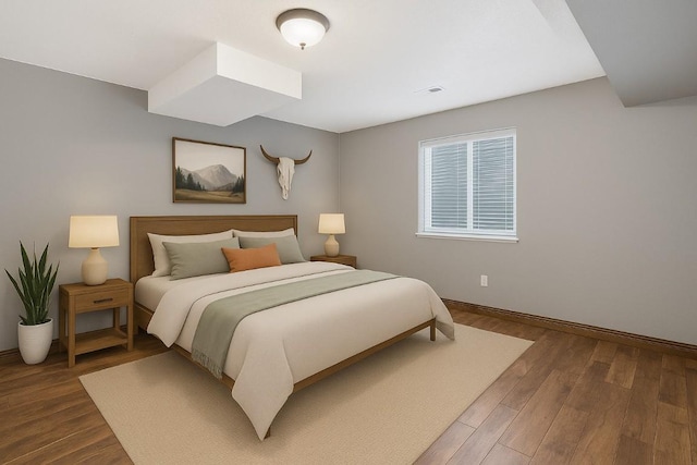 21775 4th Ave, Phippsburg, CO 80469 - bedroom with wood finished floors and baseboards