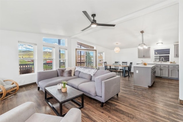 21775 4th Ave, Phippsburg, CO 80469 - living room featuring lofted ceiling, dark wood finished floors, and a ceiling fan
