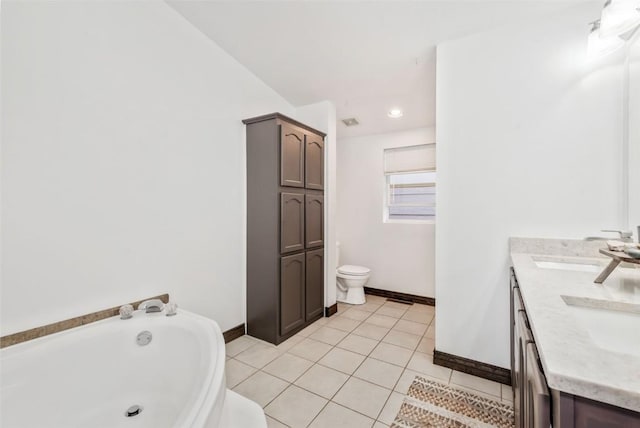 21775 4th Ave, Phippsburg, CO 80469 - bathroom with a garden tub, double vanity, baseboards, and toilet