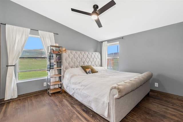 21775 4th Ave, Phippsburg, CO 80469 - bedroom with vaulted ceiling, wood finished floors, baseboards, and ceiling fan