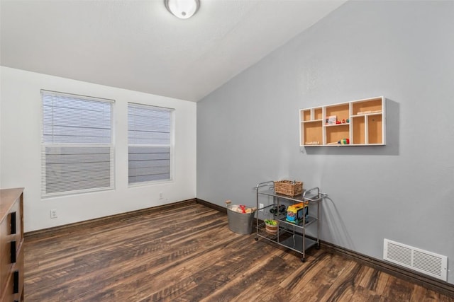 21775 4th Ave, Phippsburg, CO 80469 - spare room featuring vaulted ceiling, wood finished floors, and baseboards