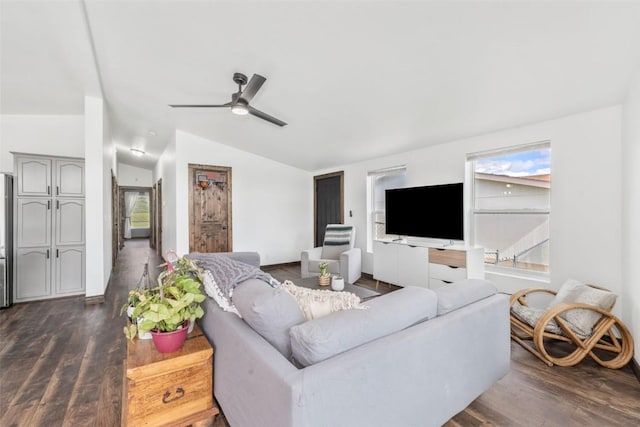 21775 4th Ave, Phippsburg, CO 80469 - living area featuring lofted ceiling, dark wood-style flooring, ceiling fan, and baseboards