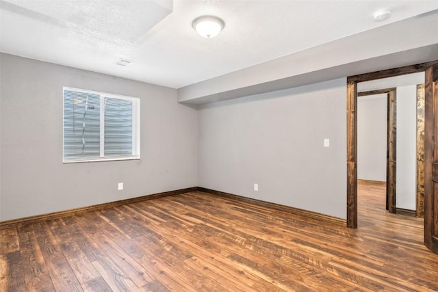 21775 4th Ave, Phippsburg, CO 80469 - below grade area featuring wood-type flooring and baseboards