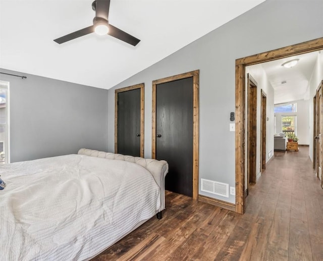 21775 4th Ave, Phippsburg, CO 80469 - bedroom with wood finished floors, lofted ceiling, baseboards, and ceiling fan