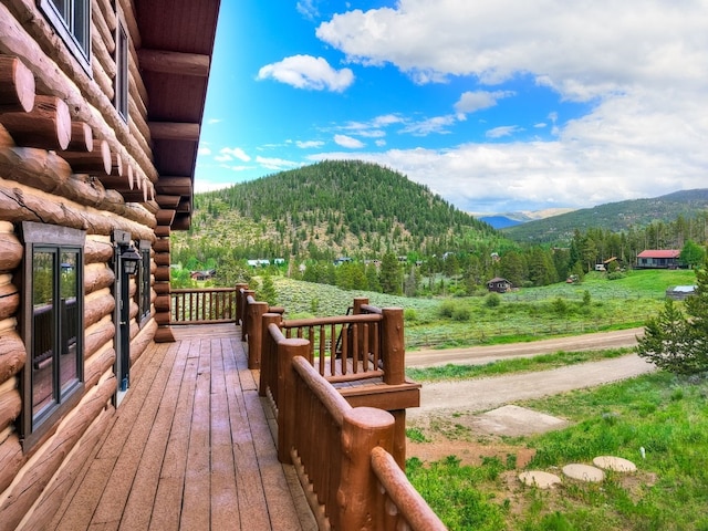922 Braddock Dr, Breckenridge, CO 80424 - wooden terrace featuring a mountain view and a view of trees