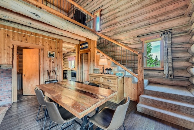 922 Braddock Dr, Breckenridge, CO 80424 - dining room with stairway, dark wood finished floors, and log walls