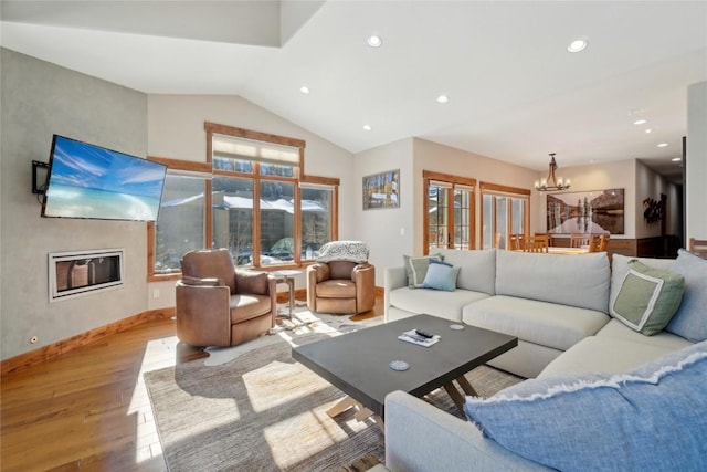 481 W Main St Unit A201, Frisco, CO 80443 - living area featuring baseboards, recessed lighting, a chandelier, lofted ceiling, and wood finished floors