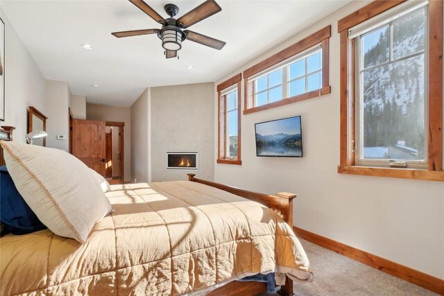 481 W Main St Unit A201, Frisco, CO 80443 - carpeted bedroom featuring ceiling fan, baseboards, a large fireplace, and recessed lighting