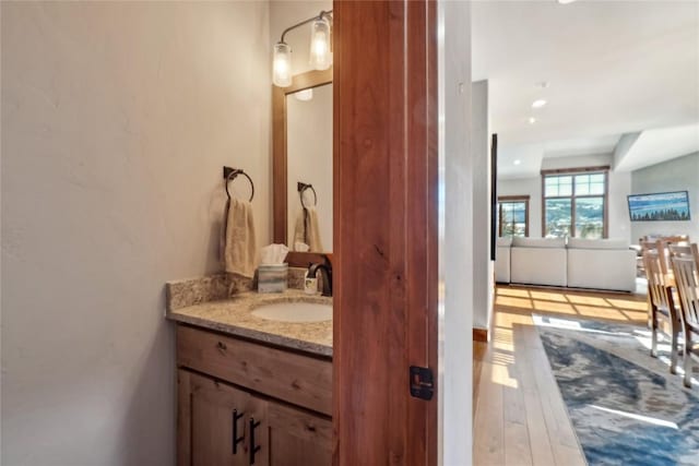 481 W Main St Unit A201, Frisco, CO 80443 - bathroom featuring vanity and wood finished floors