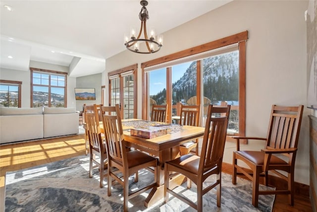 481 W Main St Unit A201, Frisco, CO 80443 - dining room with a chandelier and wood finished floors