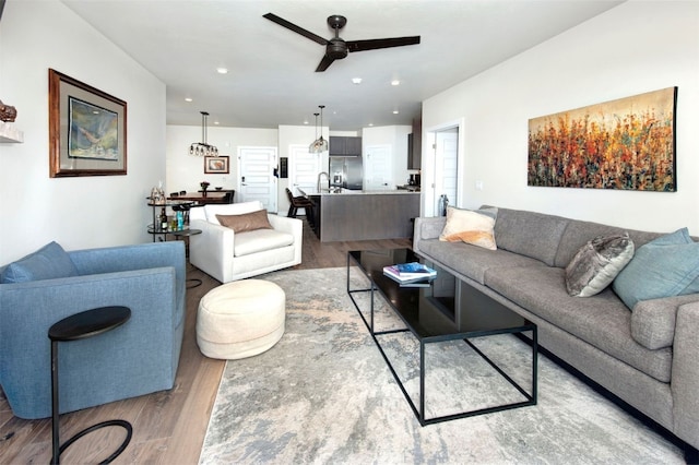 235 E Ln Bonte St Unit 207, Dillon, CO 80435 - living area featuring wood finished floors, ceiling fan, and recessed lighting