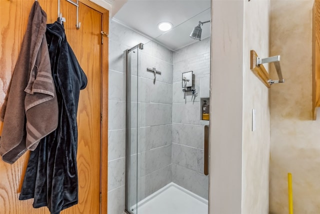 full bathroom with a shower stall