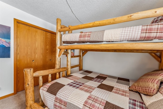 bedroom with a closet and carpet flooring